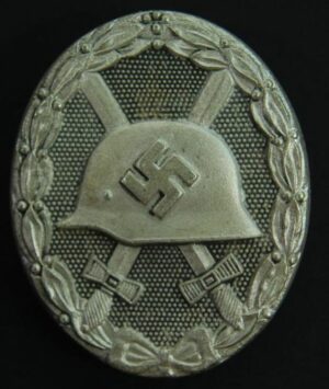 Distintivo de Herido en Plata, Código "65"
