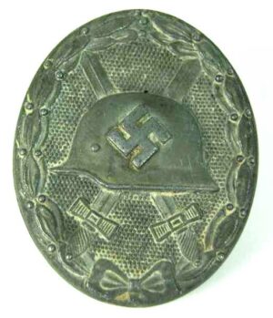 Distintivo de Herido en Plata "65"