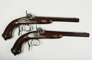 Pareja de Pistolas de Duelo Españolas firmadas "De pintas, Don José Aranguren en Eibar, Año 1856".